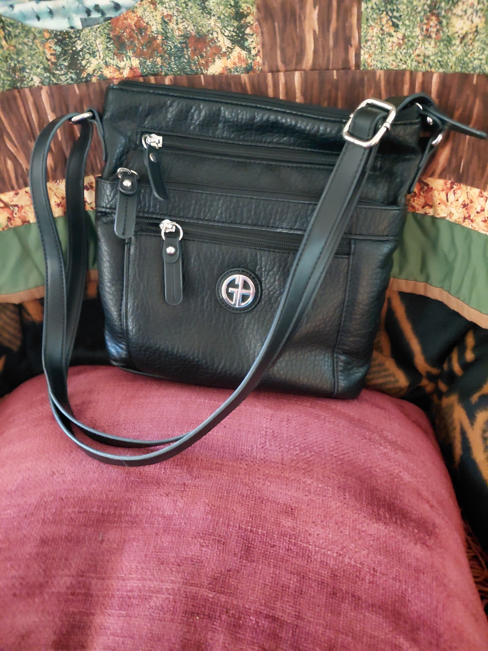Black Leather Crossbody Bag with Silver Logo Accent